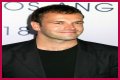 Jonny Lee Miller flashes ink for Ellen charity